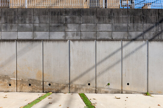street wall background ,Industrial background, empty grunge urban street with warehouse brick wall