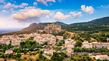 Obraz premium The beautiful medieval town of Le Barroux, Vaucluse, Provence, France. Aerial view of Le Barroux village with its castle, Provence, France. Perched village of Barroux and its fortified castle, France.