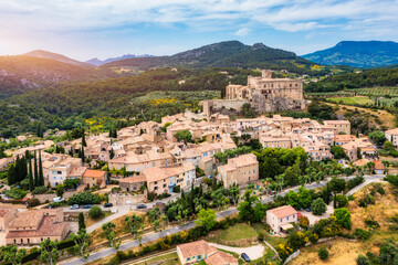 Fototapeta premium The beautiful medieval town of Le Barroux, Vaucluse, Provence, France. Aerial view of Le Barroux village with its castle, Provence, France. Perched village of Barroux and its fortified castle, France.
