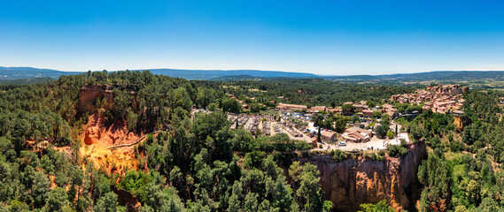Explore the charming hillside village of Roussillon in Provence, France showcasing stunning landscapes and historic architecture. Village of Roussillon in Provence, known for its unique ochre cliffs.