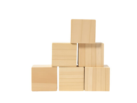 Wooden building blocks stacked high, great for kids' play or educational use