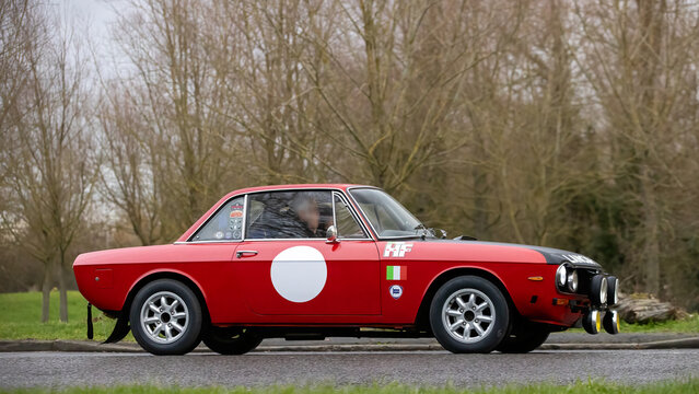 Milton Keynes,Bucks,UK - Jan 1st 2026: 1975 red Lancia Fulvia Coup&eacute; classic cardriving on a British road