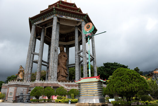 Majestic view of Kek Lok Si Temple featuring the towering Guanyin Pavilion and traditional pagoda architecture in Penang, Malaysia.