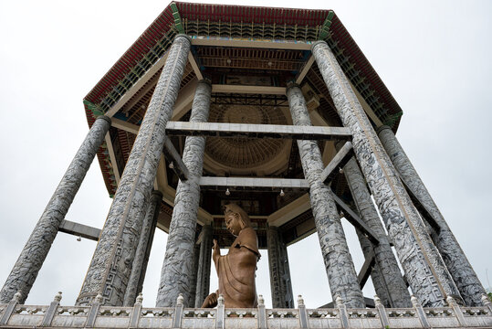 Majestic view of Kek Lok Si Temple featuring the towering Guanyin Pavilion and traditional pagoda architecture in Penang, Malaysia.