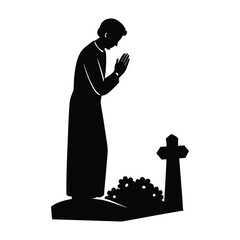 Silhouette of Person Praying at a Grave with Flowers 