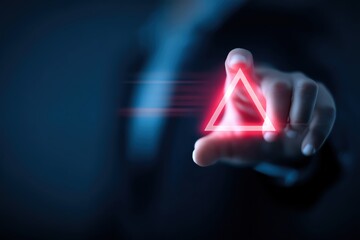 A close-up of a hand interacting with a glowing triangular interface.