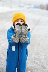 kid boy in warm jacket