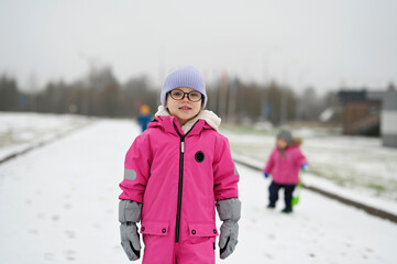 kid girl in warm jacket