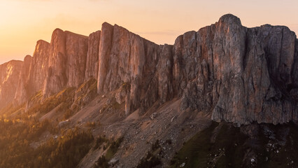 Panoramic view of national park Bolshoy Tkhach mountain in Caucasus with sunset tones
