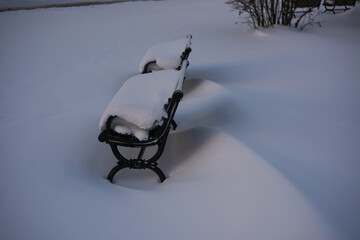 snow covered bench