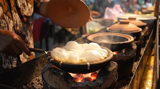 Cooking Traditional Indonesian Dessert "Serabi" Over Coals