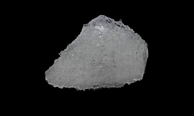 Lump of alum on a black background.