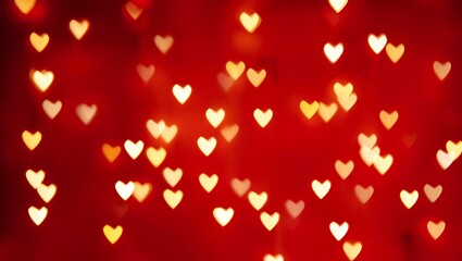 Golden heart-shaped bokeh lights creating a festive border on a vibrant red background