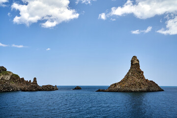 Rocky islet on the Cyclops coast on the island of Sicily © GKor
