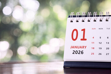 Calendar page of January 2026 on desk, with copy space. monthly planning concept, important schedules, meetings, and appointments.