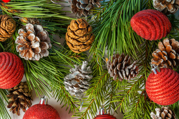 A New Year's composition of pine and spruce branches. Flat layout, top view