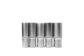 Set of interchangeable heads for ratchet wrench isolated on white background.