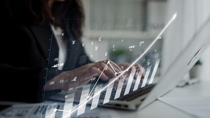 A focused businesswoman works on a laptop, analyzing financial data with a dynamic graph visualization, representing growth and productivity in a sleek office setting. Copula