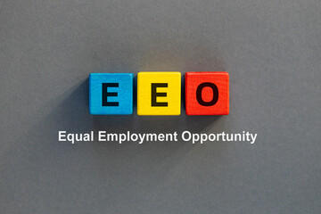 Symbol EEO, Equal Employment Opportunity. Business concept. Fair treatment in employment, no discrimination based on race, gender, religion, or nationality. Flat lay. copy space