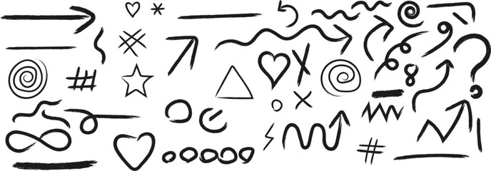 Obraz premium A collection of diverse hand drawn doodle elements including arrows hearts stars spirals and various abstract shapes scattered across a white background