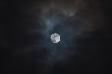 full moon over blue sky