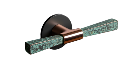 Stylish door handle with copper and green stone on dark wooden door panel