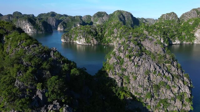 Asia, Vietnam, Ha Long Bay Unesco Heritage is one of the seven natural beauties in the world with its emerald waters and limestone islands covered by rainforest .  tourist attraction for boat cruises 