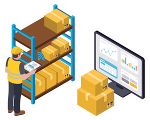 Warehouse worker uses tablet to manage inventory and data on computer screen.