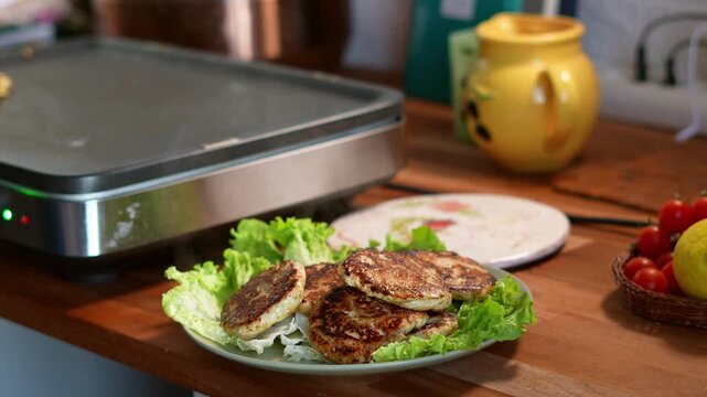 Hot and fresh Chicken cutles to serve