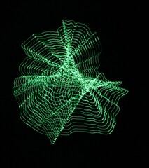 A long exposure photograph. Light painting photography, vibrant green fairy lights in a wormhole star effect against a black background