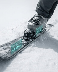 Close-up of Ski Boot and Ski with Digital Performance Data Overlay