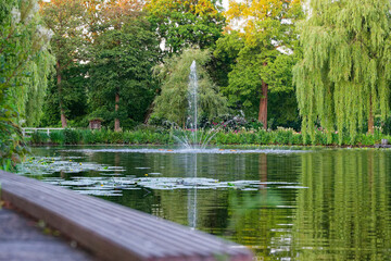 Second view of lake fountain with rising clear spray above water