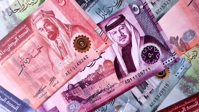 Jordan money, the Jordanian dinar currency, banknotes of various denominations, financial transactions. Jordanian money, the dinar as a financial background for your design