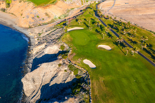  Aerial view of Meloneras Golf Course and Pasito Blanco  Marina, Featuring Luxury Yacht Berths and Frontline Villa Estates, Gran Canaria, Spain
