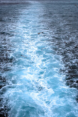 Speedboat foam trail in the sea