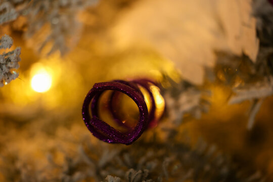 Christmas tree decoration for the winter holiday season. A tradition to hand ornaments on trees. 