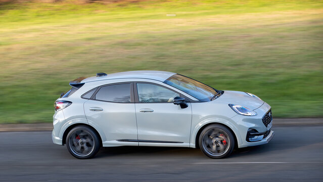 Milton Keynes,Bucks,UK - Dec 15th 2025: 2025 Ford Puma hybrid electric SUV car driving on a British road