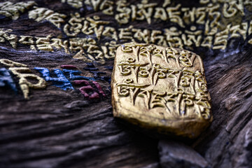 Tibetan prayer mantra written on stone