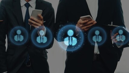 Diverse business professionals engage with mobile devices, symbolizing modern communication and networking in a corporate environment enriched with digital icons. Raster