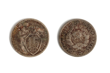 Vintage Soviet 15 kopeks coin from 1932 showing heavy wear and corrosion, photographed front and back on white background.
