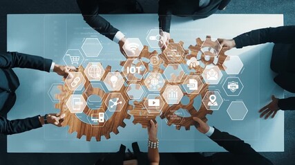 A top-down view of a business meeting showcasing diverse professionals collaborating on digital technology, emphasizing innovation and data analytics for effective strategy development. Raster