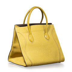Large ochre yellow leather bag with a modern and minimalist design, photographed against a white background with reflections.
