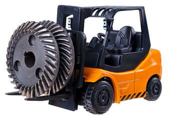Toy forklift lifting two metal gears on isolated background.