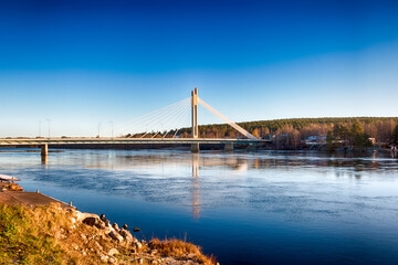 The famous Lumberjack's Candle Bridge over Kemijoki river in Rovaniemi, Finland. HDR.