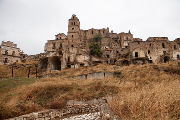 Craco is a famous "Ghost town" in Basilicata, Italy. Residents abandoned it after several earthquakes caused landslides, making the houses on the slopes slide and collapse.