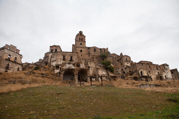 Craco is a famous "Ghost town" in Basilicata, Italy. Residents abandoned it after several earthquakes caused landslides, making the houses on the slopes slide and collapse.