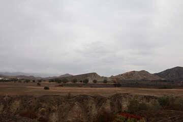 Calanchi are unique 'badlands' in Basilicata, Italy, formed by white clay erosion in the area surrounding the ghost town, Craco.