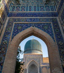 Entrance portal to Gur-e-Amir Mausoleum. View on azure dome. Timur's tomb in Samarkand (Uzbekistan). Not AI