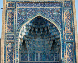 Mosaic arch of entrance portal to Gur-e-Amir Mausoleum in Samarkand (Uzbekistan). Not AI