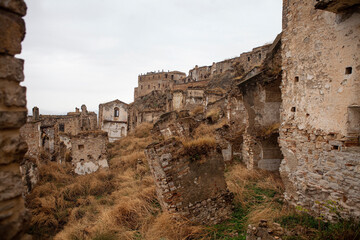 Craco is a famous "Ghost town" in Basilicata, Italy. Residents abandoned it after several earthquakes caused landslides, making the houses on the slopes slide and collapse.